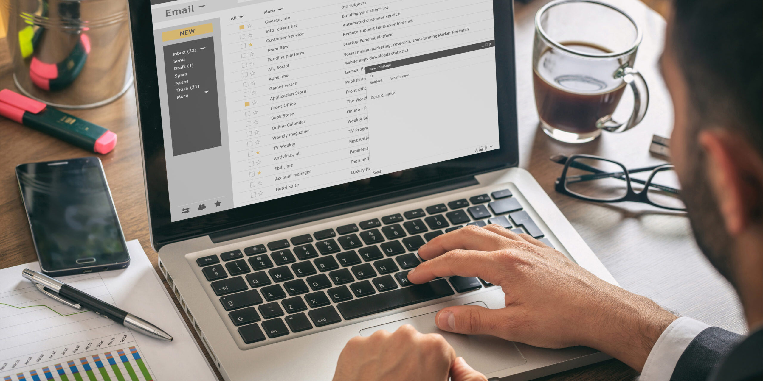 Man Working With A Laptop. Emails List On The Screen, Office Background